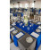 Square charcoal polyester tablecloth with blue runners for wedding guest tables